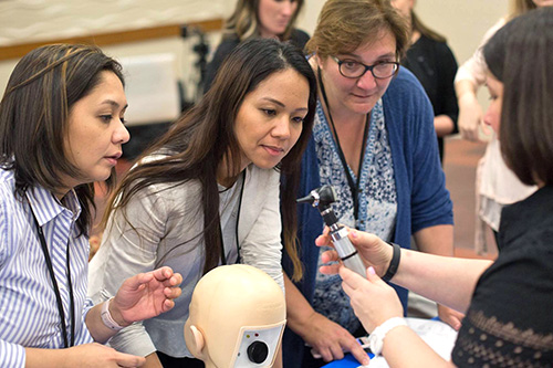 Nursing students in a lab