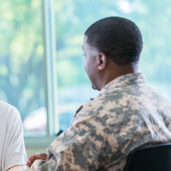 Active duty military member in a face-to-face meeting