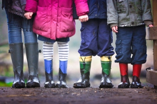 Four children standing together