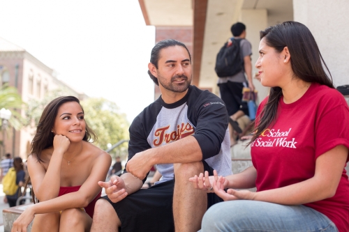 Students conversing on steps