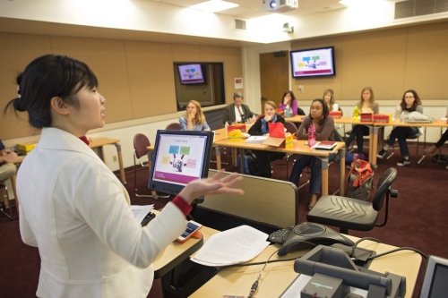 Classroom photo, teacher addressing students