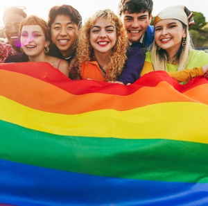 Students holding a flag